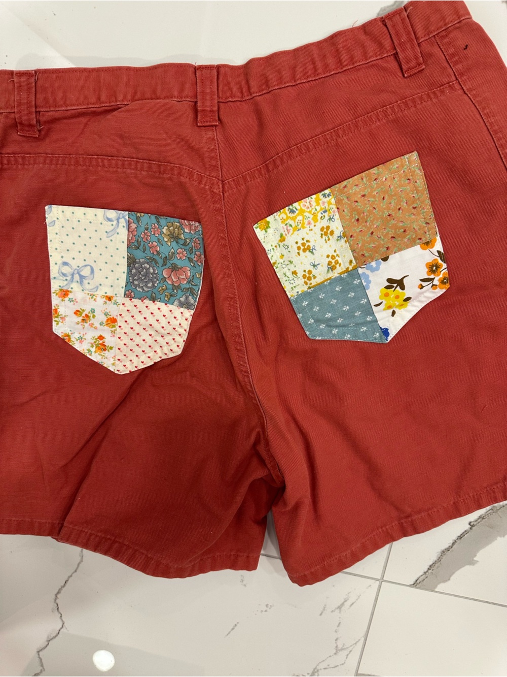 Essentials Rust Red Patchwork Pocket Bermuda Shorts